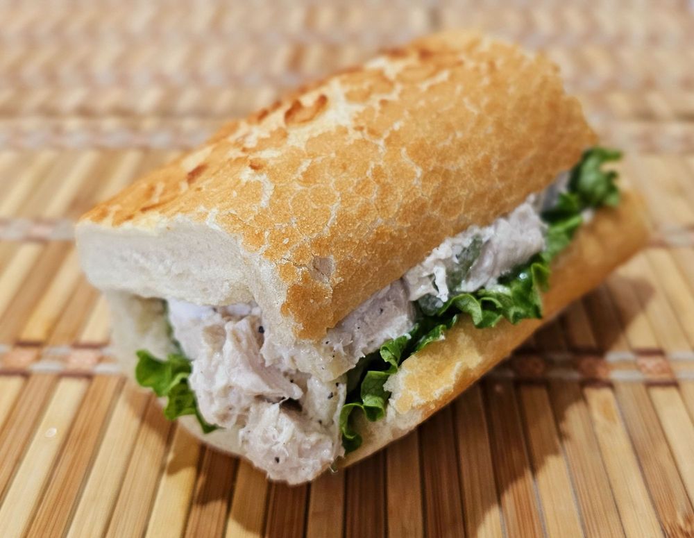 Chicken salad sandwich on a fresh french roll